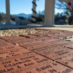 Bricks engraved with dedications line the Brick Walkin the Colonnade