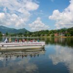 Guests enjoy guided tours aboard the Cherokee IV pontoon boat