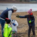 Family members find unexpected treasures during a lake cleanup