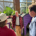 Event sponsor meets students at Spot doghouse competition